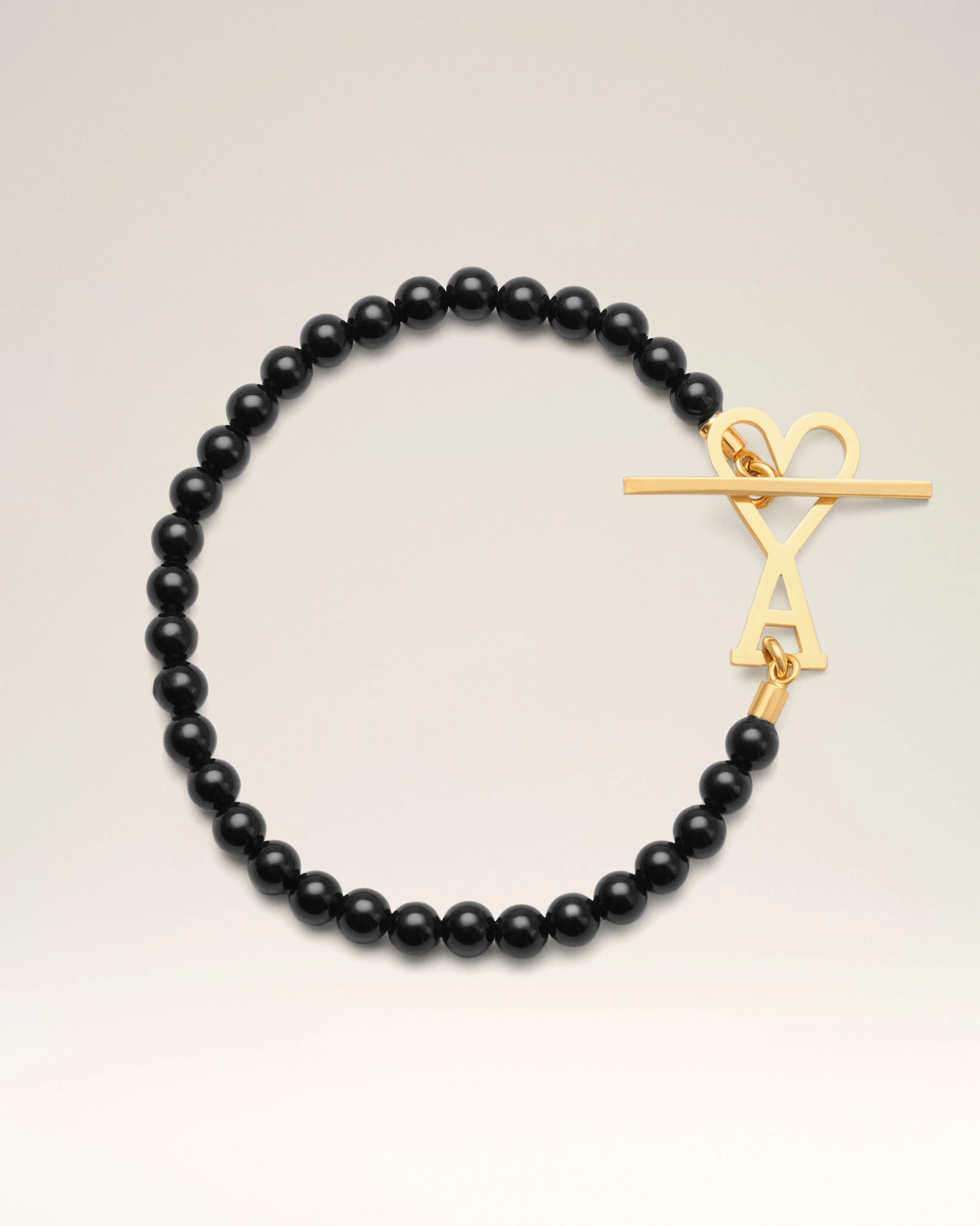 Bracelet Perles D'été Noir Ami de Coeur Doré en Laiton